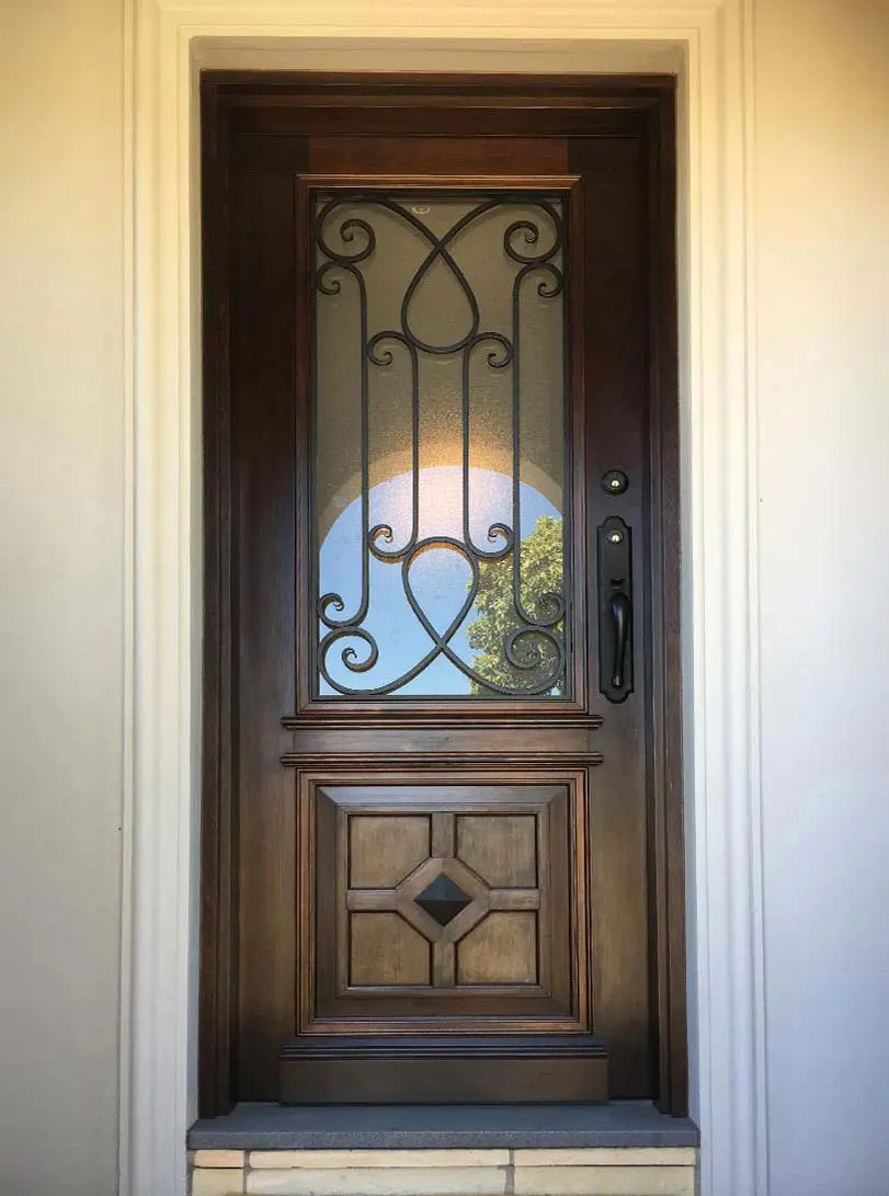 Front doors of a house with elegant design and glass panels